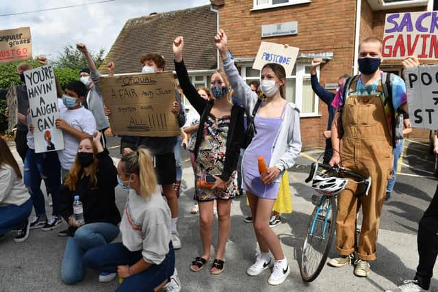A-level students protest outside the constituency office of Education Secretary Gavin Williamson.