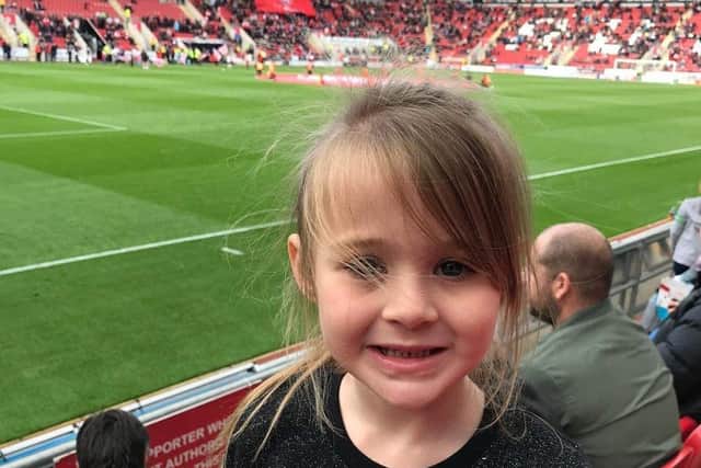 Erin at a Rotherham United football match with her dad in October 2018. (Picture: Nina Moran).