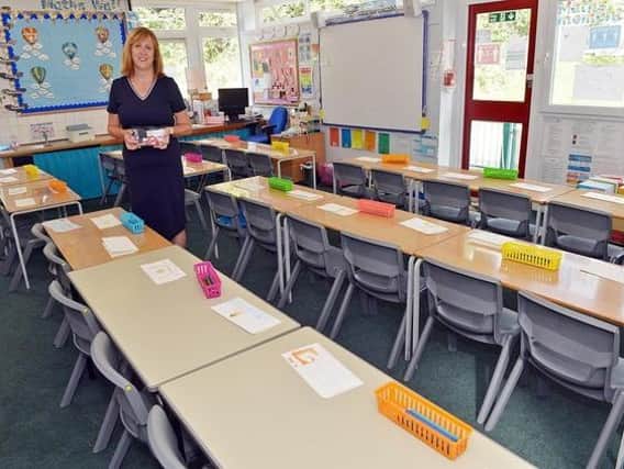 Cathy Rowland headteacher at Dobcroft Infant School explained how most desks now face forward when, before Covid-19, they would be grouped to allow students to work collaboratively