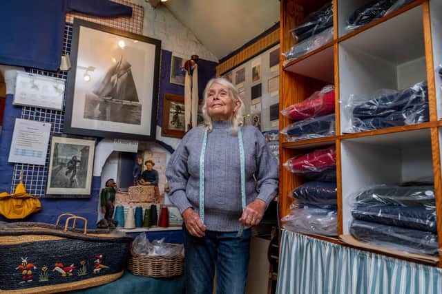 Flamborough Marine has been for many years making the Gansey, a handmade sweater worn by fisherman knitted in one piece with different patterns for different areas. Pictured Lesley Berry, owner of Flamborough Marine Ltd and Antiques in Flamborough. Picture by James Hardisty.