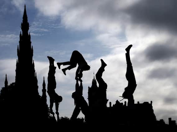 At this time of year the city of Edinburgh would normally be buzzing with excited performers and punters at the Fringe festival. Photo: Jane Barlow/PA