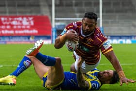 Huddersfield Giants' Ukuma Ta'ai scores against Warrington Wolves - but is injured shortly afterwards (PIC: BRUCE ROLLINSON)