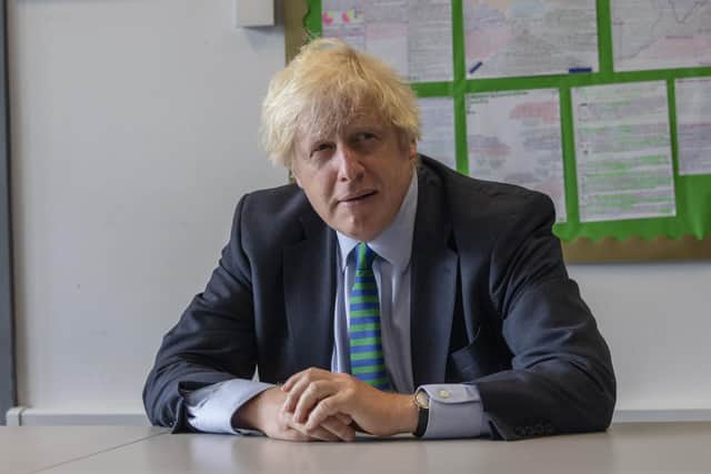 Boris Johnson during a secondary school visit - does he display sufficient statesmanship?