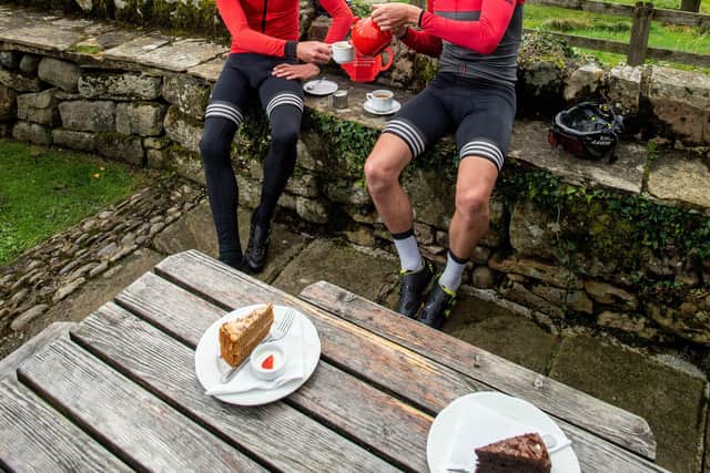 Olympians Jonny and Alistair Brownlee enjoy a cup of Yorkshire Tea at the Tea Cottage in Bolton Abbey to help promote an initiative aimed at helping cafes.
 Picture: Bruce Rollinson