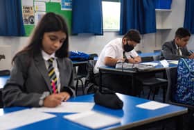 Pupils from years 7 and 11 return to Manor High School in Oadby, Leicestershire. Currently the school has adopted a voluntary policy with regards to students wearing face coverings. Picture: Jacob King/PA Wire