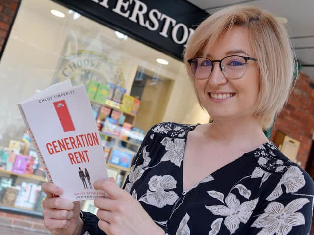 Chloe Timperley with her book Generation Rent. Photo: Brian Eyre