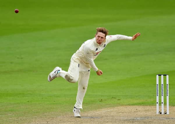 England's Dom Bess bowling during day two of the First Test match against Pakistan at Old Trafford. Picture: Dan Mullan/NMC Pool/PA