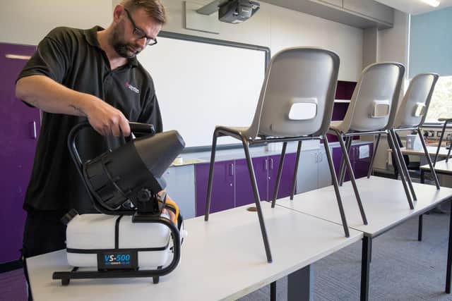 A fogging machine, which can disinfect a whole classroom, is set up in a classroom at Ark Charter Academy in Portsmouth, as preparations are made before the start of the new term.
