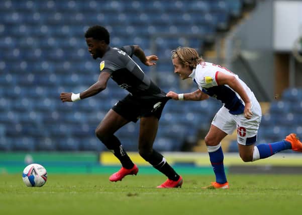 Action from Doncaster's opening game at Blackburn (PIcture: PA)