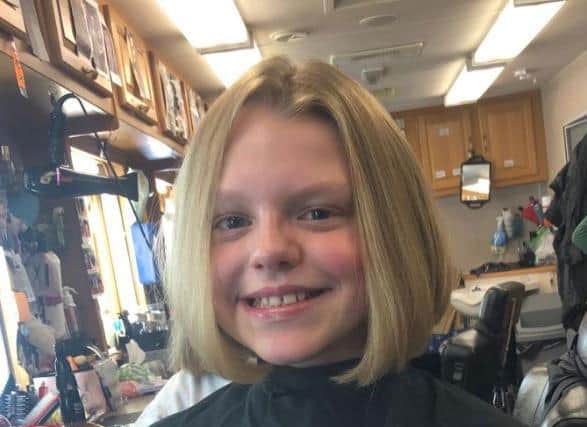 Hattie Edkins after having 17 inches cut from her hair for All Creatures Great and Small.