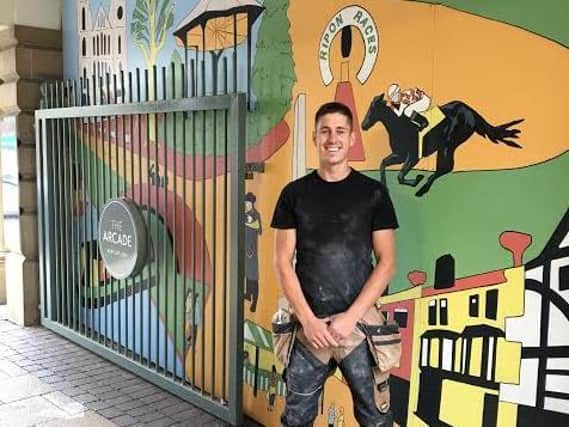 Paul Kelly, the site manager of Percy Pickard Contractors, the lead contractor in charge of the refurbishment works at The Arcade in Ripon. The picture shows the mural featuring Ripon landmarks which was created by Wall Nuts Murals
