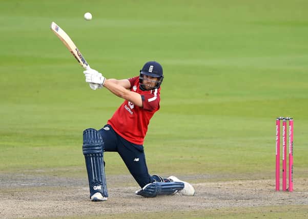 England's Dawid Malan strikes the ball for six against Pakistan at Old Trafford.