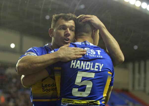 Ash Handley celebrates his opening try with Brett Ferres. in February 2019. (Picture: Bruce Rollinson)