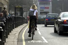 A cyclist makes their way through Headingley - should more cycle lanes be built?