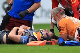 WORRYING TIME: Castleford Tigers' James Clare receives treatment after sustaining a neck injury on Saturday. Picture: Mike Egerton/PAA