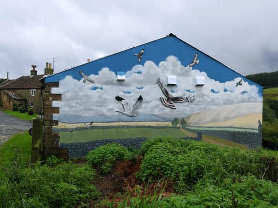 The mural pointedly overlooks a grouse moor