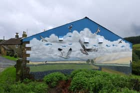 The mural pointedly overlooks a grouse moor