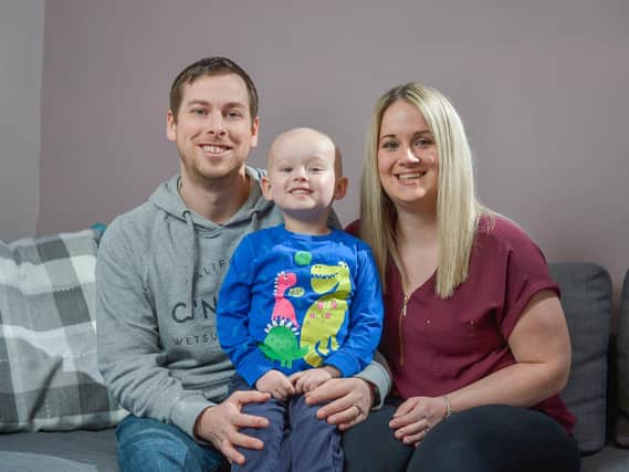 A Wakefield mum has shared the heartbreaking story of her son's cancer diagnosis, admitting she had 'literally zero concerns' when she first took him in for a blood test. Pictured is Oliver with parents James and Laura. Photo: SWNS