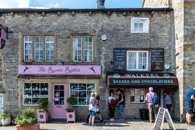 The Rustic Rabbit became a bakery and Walker's appears as a cycle shop