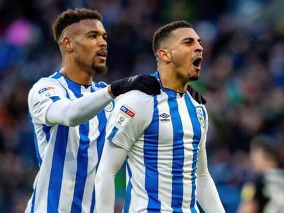 Karlan Grant pictured with fellow Huddersfield Town striker Steve Mounie. Picture Bruce Rollinson