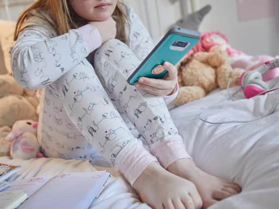 The NSPCC is calling on Government to push forward with its Online Harms Bill. Child pictured is a model. Image: Tom Hull.