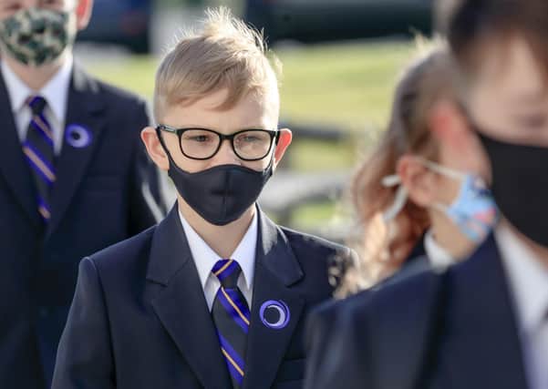 Pupils wear protective face masks at Outwood Academy Adwick in Doncaster, as schools in England reopen to pupils following the coronavirus lockdown.