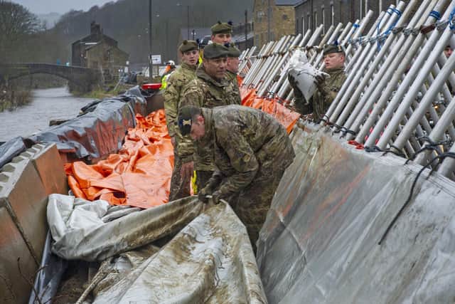 The Army were called in to erect temporary flood defences along the banks of the River Calder earlier this year.
