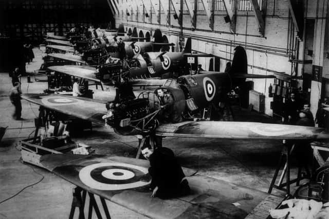 circa 1940:  The Spitfire production line at the Vickers Supermarine Works in Southampton.  (Photo by Keystone/Getty Images)