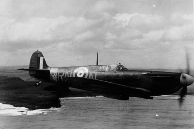 circa 1940:  A spitfire of 72 Squadron, based at Acklington in the North East of England, flies out across the sea on a mission.  (Photo by Fox Photos/Getty Images)