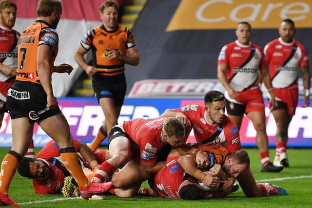 Castleford Tigers' Paul McShane scores one of his two tries against Salford. (PIC: JONATHAN GAWTHORPE)