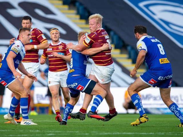 Huddersfield Giants prop Matty English takes on St Helens (PIC: BRUCE ROLLINSON)