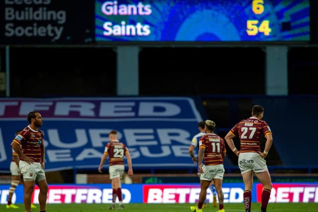 Scoreboard says it all for dejected Huddersfield Giants player (PIC: BRUCE ROLLINSON)