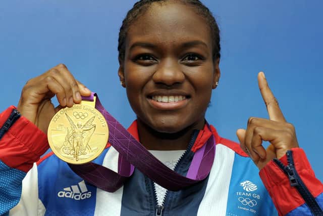 Great Britain's Nicola Adams with a winning gold medal. Photo: Tim Ireland/PA