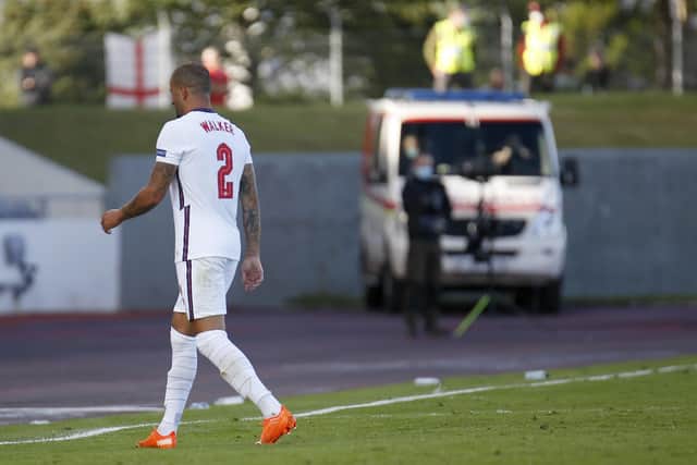 Early bath: England's Kyle Walker leaves the field after getting a red card against Iceland. Picture: AP Photo/Brynjar Gunnarson