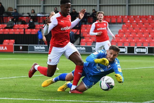 Rotherham's Chiedozie Ogbene is thwarted by Salford's Vaclav Hladky.