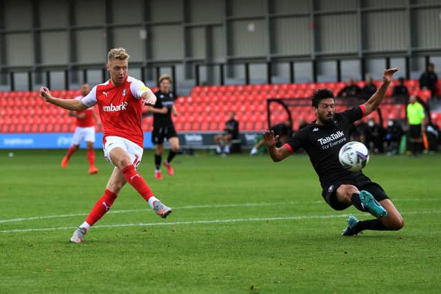 Rotherham's Jamie Lindsay has his shot saved by Salford's Vaclav Hladky.