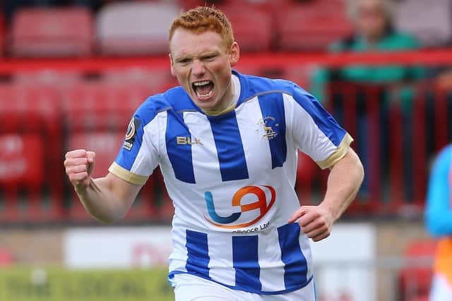 SIGNING: Michael Woods