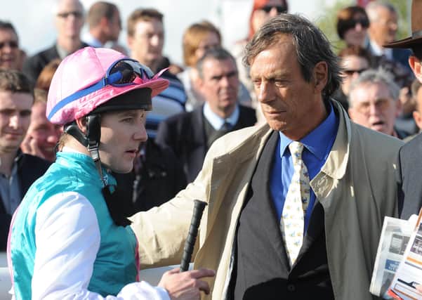 Tom Queally debriefs Sir Henry Ceci after Frankel's win at Doncatser 10 years ago.