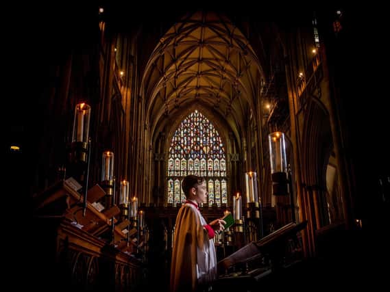 Chorister Oliver Musgrave, aged 12, pictured at York Minster in December last year. Picture: James Hardisty