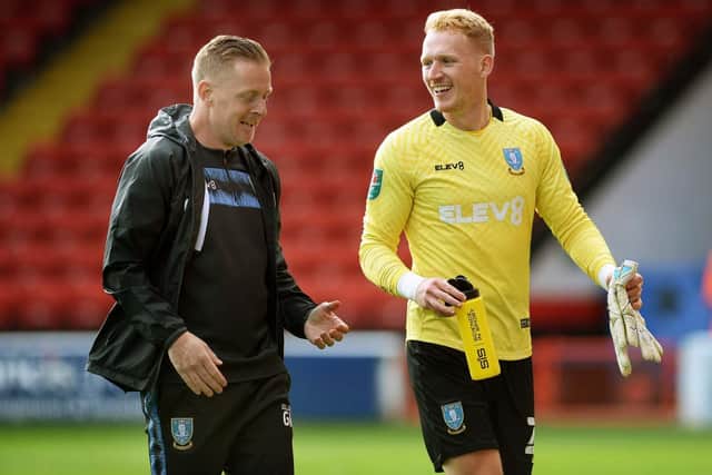 Sheffield Wednesday goalkeeper Cameron Dawson gets congratulated by Garry Monk (Picture: Steve Ellis)