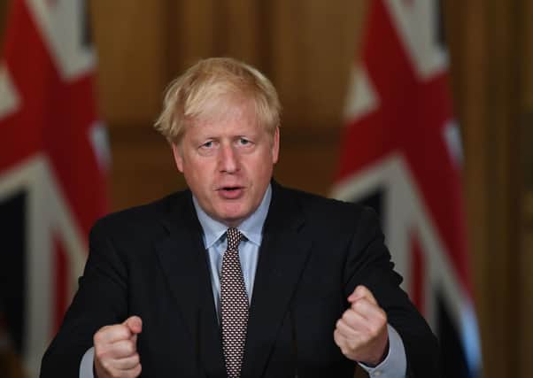 Prime Minister Boris Johnson during a virtual press conference at Downing Street, London, following the announcement that the legal limit on social gatherings is set to be reduced from 30 people to six. The change in the law in England will come into force on Monday as the Government seeks to curb the rise in coronavirus cases.