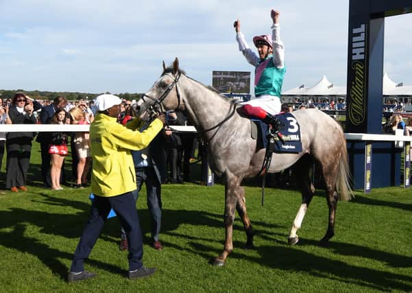 This is Frankie Dettori celebrating Logician's success in last year's St Leger.