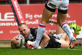 Hull's Adam Swift scores his second try.   Pictures: Jonathan Gawthorpe