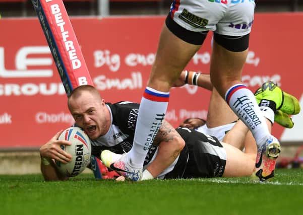 Hull's Adam Swift scores his second try.   Pictures: Jonathan Gawthorpe