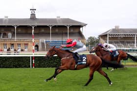This is Spright winning on day two of the St Leger meeting for trainer Karl Burke and jockey Clifford Lee.