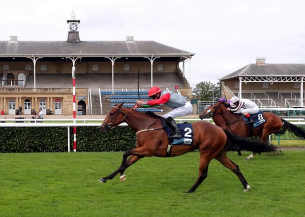 This is Spright winning on day two of the St Leger meeting for trainer Karl Burke and jockey Clifford Lee.