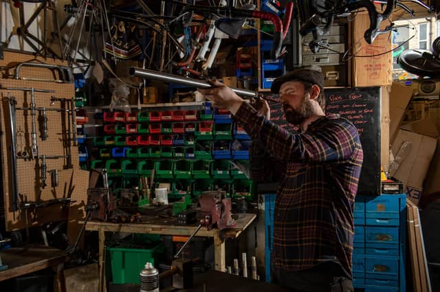 Bicycle frame builder Paul Gibson at work on a bespoke steel frame at Ellis Briggs Cycles, Shipley.
Picture Bruce Rollinson