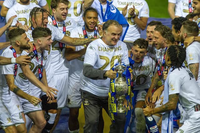 Leeds lift the championship trophy at Elland Road, winning the division and promoted to the Premier League . Photo credit: Tony Johnson