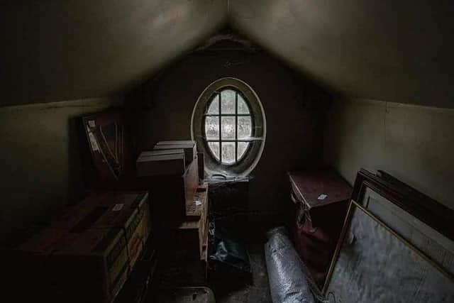 An attic room in an empty, desolate mansion in Yeadon