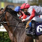 Rowan Scott riding Ubettabelieveit (near side) win The Bombardier Flying Childers Stakes during day three of the  St Leger Festival at Doncaster Racecourse.